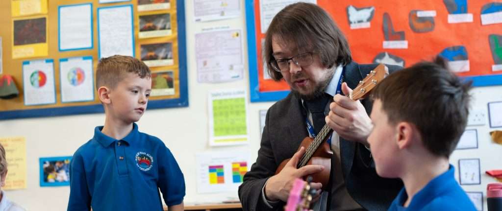 About Calderdale Music Header Image of a Ukulele Lesson